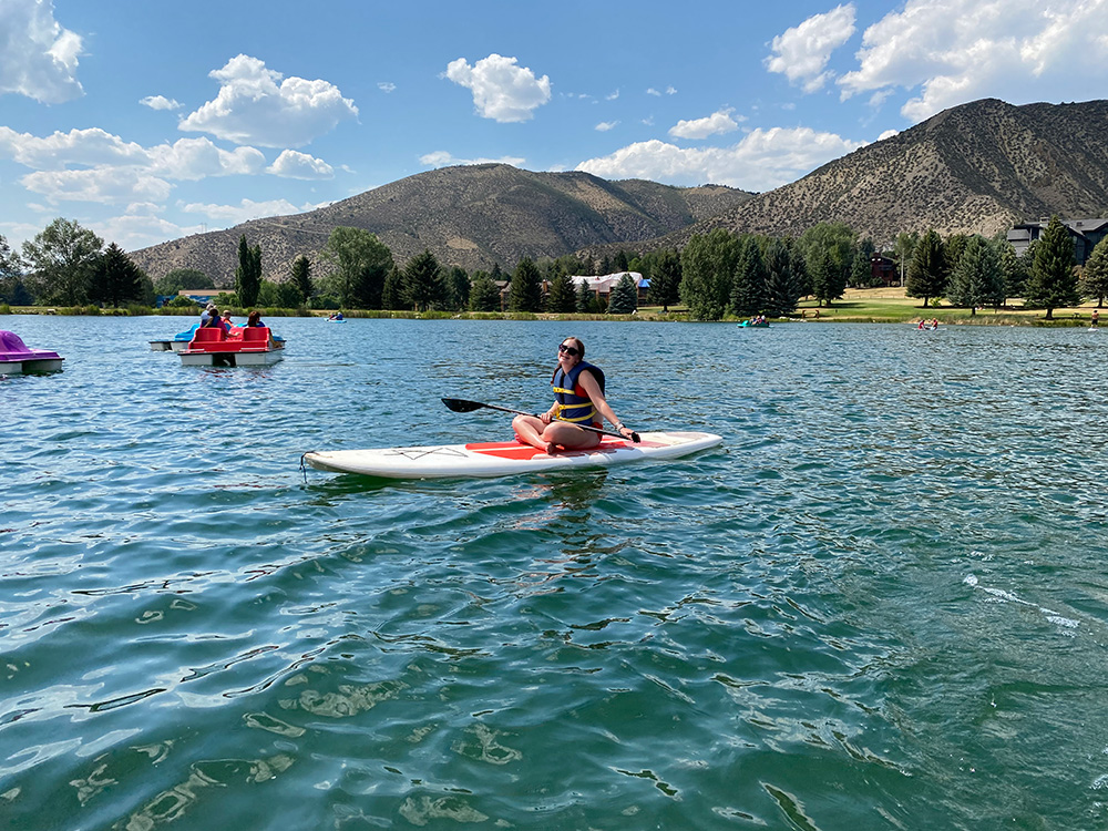 Girl smiling on paddleboard