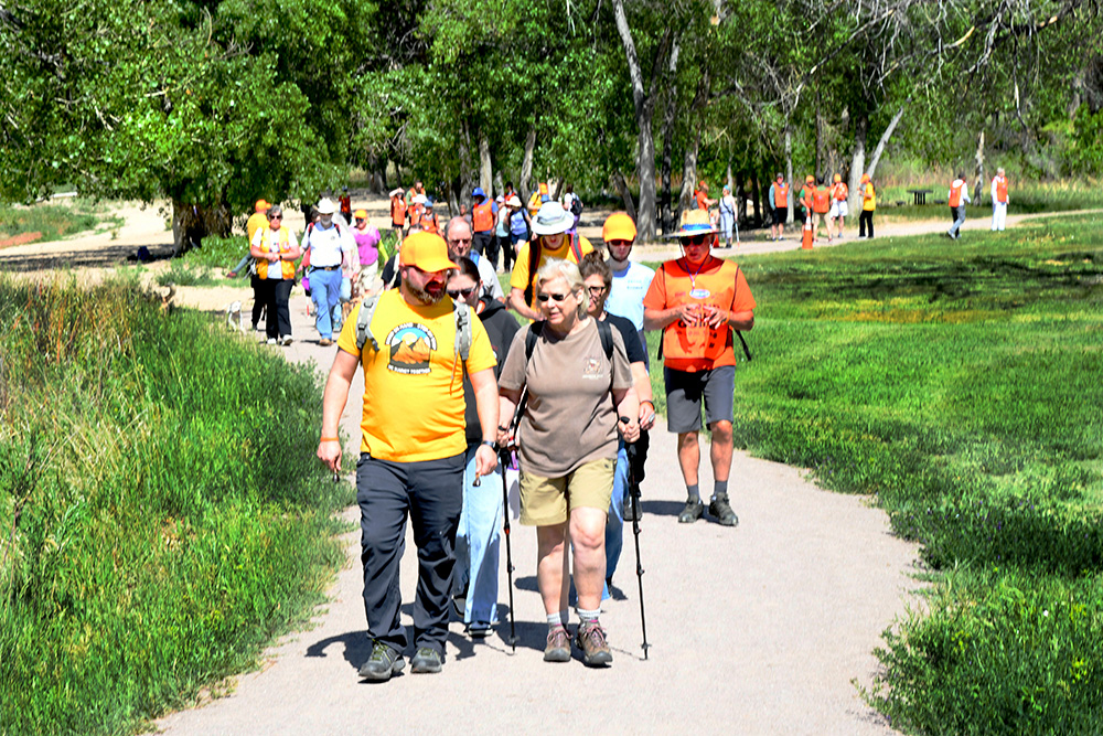 Lead Walkers on trail with group following behind