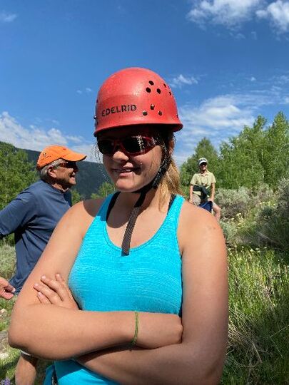 Ryan wearing a red helmet at summer camp