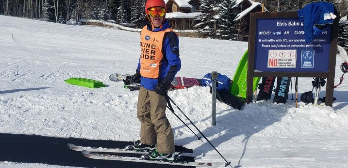 Blind Skier Guide in ski gear