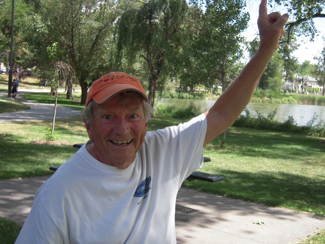 Bill Murphy pointing up in the air