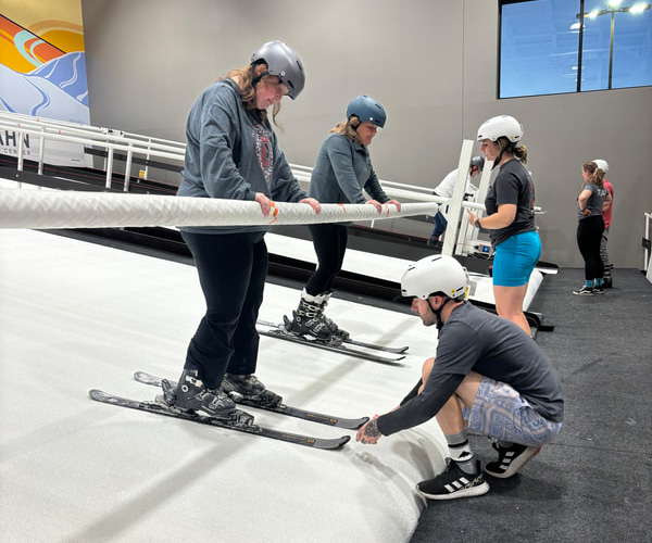 Skiers practicing in an indoor ski slope
