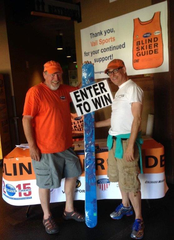 Randy White and Mark Davis in front of Foresight information table